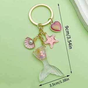 Llaveros personalizados <span class=keywords><strong>de</strong></span> la serie Ocean con conchas, estrellas <span class=keywords><strong>de</strong></span> mar y pez payaso: Un regalo para el chico <span class=keywords><strong>de</strong></span> la <span class=keywords><strong>novia</strong></span> - Product Image 4