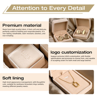 Boîte à bijoux de mariage en velours personnalisée avec logo sur mesure, emballage de bijoux en carton recyclable de forme rectangulaire avec fermeture à boucle