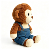 Jouet singe en peluche super doux et bouclé avec salopette en jean bleu, poupée singe en peluche moelleuse, cadeau compagnon, jouet singe en peluche