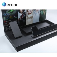 RECHI Comptoir personnalisé noir mat en forme de L en acrylique Power Bank Présentoir de point de vente au détail avec signalisation arrière pour accessoire de téléphone portable