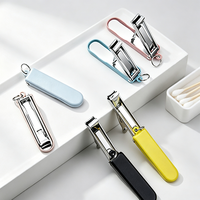 Ensemble de coupe-ongles pliables portables en acier inoxydable avec étui en cuir, porte-clés, taille voyage, outil de manucure, logo personnalisé OEM ODM