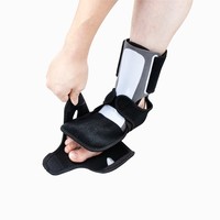 Attelle orthopédique professionnelle noire pour l'hiver, stabilisateur de pied, support nocturne pour entorse de la cheville et expansion plantaire, unisexe