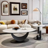 Ensemble de tables basses ovales avec plateau en pierre frittée et base en métal noir artistique, décoration moderne, table à thé et table d'appoint pour salon et maison