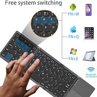 Clavier sans fil rechargeable pliable avec pavé tactile, format de poche, accessoire de voyage pliable pour ordinateur portable, iOS, Android, Windows - Gris sidéral