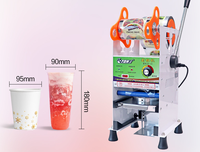 Machine à sceller les tasses en plastique largement utilisée Machine à sceller les tasses à thé à bulles manuelle et scellant de tasses pour jus de lait Bobo Tea