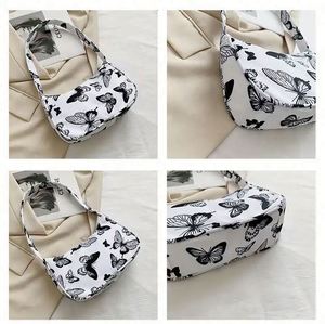 Wholesale Butterfly <b>Candy</b> Pattern Button Closure Single Strap PU Handbags Fashion Women Shoulder Bags 6 Inch Polyester Lining - Product Image 4