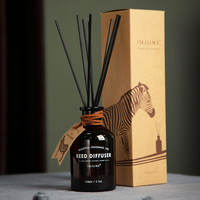Emballage de logo personnalisé Bouteilles en verre vides d'aromathérapie de diffuseur de roseau ambre givré de luxe de 100ml 250ml avec boîte pour la décoration intérieure