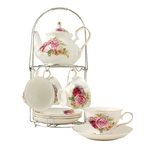 Gran oferta, juego de té de cerámica de lujo, taza y platillo de porcelana, tetera con soporte de hierro, juegos de <span class=keywords><strong>café</strong></span> y té - Product Image 1