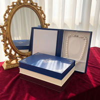 Boîte à bijoux de style livre ornée de feuille d'argent gaufrée, avec couvercle rabattable, pour collier de perles, emballage cadeau pour bijoutier de boutique