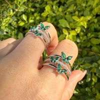 Vente en gros de bagues en argent 925 plaqué or 18 carats avec pierre émeraude taillée, design à trois couches de zircon, bague papillon, bijoux tendance