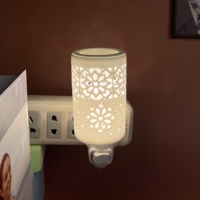 Réchauffeur de parfum de diffuseur de veilleuse électrique en céramique d'harmonie élégante enfichable pour le réchauffeur parfumé enfichable de cire d'huile aromatique