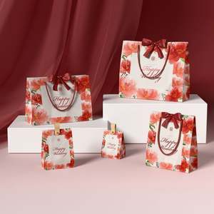 Sac en carton kraft blanc haut de gamme personnalisé pour les cosmétiques, les vêtements, les expositions et les bougies, pour les sacs cadeaux de thé au lait et les sacs à main - Product Image 1