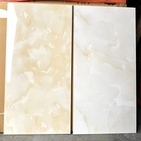 Carrelage en porcelaine effet onyx de luxe 60x120 70x150 90x180 Carrelage mural et de sol pour salle de bain Carrelage de sol en marbre 1200 X 600