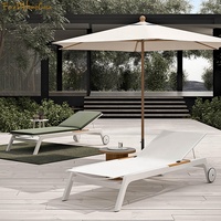 Résistant UV de chaises longues de Sun de piscine de chaises longues de plate-forme de plage de station de vacances avec des roues