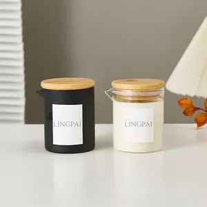 Hot selling 10 ounce custom empty black candle jar supplier with bamboo and wood lid for homemade candles