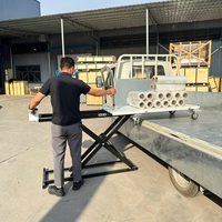Table élévatrice à ciseaux électrique portable avec capacité de 200 kg et rail coulissant pour la manutention des matériaux en entrepôt