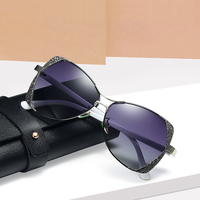 Lunettes de soleil polarisées pour femmes, style œil de chat, protection UV400, monture métallique rétro, pour la conduite en extérieur et les voyages