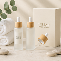 Vente en gros de flacons compte-gouttes en verre givré de 20 à 100 ml avec bouchon en bambou pour huile pour le visage, huile pour le corps, huile de massage, soins de la peau, emballage pour spa