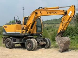 รถขุดล้อยางฮุนได 150LC-9 มือสอง เครื่องยนต์คัมมินส์ ระบบไฮดรอลิกฮิตาชิ ความจุบุ้งกี๋ 0.58 ลูกบาศก์เมตร น้ำหนัก 14 ตัน ระบบเกียร์ PLC ปั๊ม แบริ่ง - Product Image 4