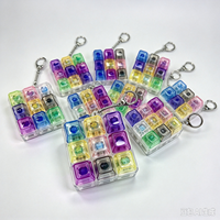 Porte-clés Fidget à 9 touches LED transparentes, clavier sensoriel, jouet anti-stress, pendentif coloré pour sac, vente en gros