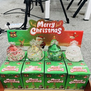 Entrepôt USA : Lot de 72 jouets de Noël scintillants 4 couleurs, en forme d'arbre, rembourrés au maltose, à remontée lente, anti-stress, avec boîte - Product Image 2