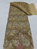Tissu brodé de fleurs perlées pour robes de mariée et robes de soirée
