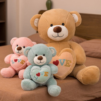 Ours en peluche de saint-valentin avec cœurs assortis, vente en gros, design fantaisie créatif, tenir le cœur