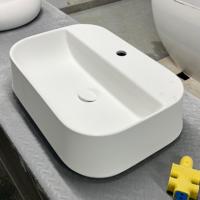 Évier moderne blanc mat à surface solide, comptoir en pierre artificielle rectangulaire, égouttoir poli à trou unique pour salle de bain hôtels