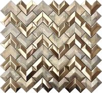 El diseño en forma de V de acero inoxidable y bronce con mosaico de metal es adecuado para paredes interiores