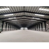 Bâtiment modulaire préfabriqué léger en structure d'acier, kit d'entrepôt, d'usine logistique, de grange, d'atelier ou de hangar à ossature métallique