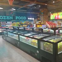 Congélateur îlot vitré avec extérieur en acier peint, intérieur en aluminium et dégivrage automatique pour supermarchés