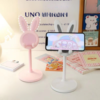 Le support de téléphone portable en forme de lapin mignon pour bureau, réglable et inclinable, avec poignée pour téléphone, accessoire de bureau.
