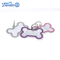Nouvelle médaille d'identification pour chien en alliage de zinc durable, anti-perte, en forme d'os, gravée au laser, promotionnelle, avec pendentif métallique.