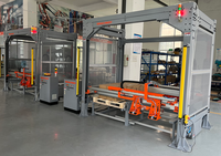 Robot élévateur de cargaison de palette déchargeant le produit de la machine de moulage par injection