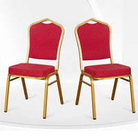 Chaise de restaurant fabriquée en usine en Chine Chaise de salle d'événement robuste et résistante Chaise de banquet empilable à cadre doré en métal à vendre