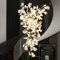 Lustre en fer en forme de feuille de Ginkgo, finition dorée, éclairage à économie d'énergie, température de couleur sélectionnable, design luxueux pour l'éclairage du salon