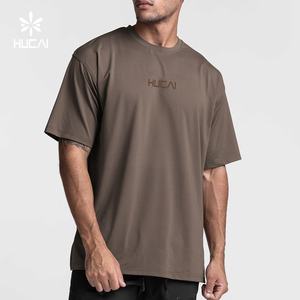 Maglietta da Palestra OEM HUCAI Personalizzata in Cotone e Spandex con Orlo Diviso Vestibilità Ampia Oversize per Uomo - Product Image 1