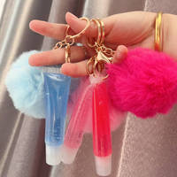 Porte-clés brillant à lèvres mignon mini brillant à lèvres huile pour les lèvres végétalienne avec pompon maquillage repulpant