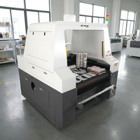 Solution de découpe laser professionnelle, découpeuse laser CO2 9070 pour la découpe de films TPU et d'étiquettes en cristal, production efficace