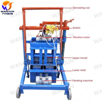 Machine de production de blocs de béton et de briques creuses en ciment manuelle QT2-45A durable et à haute efficacité pour matériaux de construction mobiles