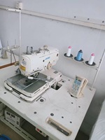 Máquina de coser industrial Juki 3200 usada, controlada por computadora, avanzada, para ojales y botones