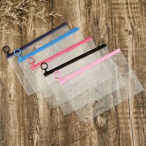 ถุงซิปใสแบบมีเชือกผูก ผลิตจากพีวีซีใส ขนาด 21*17 ซม. พิมพ์ออฟเซ็ต สำหรับบรรจุภัณฑ์เสื้อผ้า ถุงเท้า รองเท้า ป้องกันความชื้น รับผลิตตามแบบ - Product Image 1