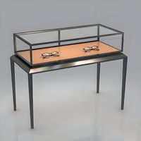 Vitrine d'exposition en verre trempé avec cadre en métal noir pour lunettes, meuble de magasin d'optique, fabricant