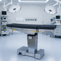Table d'opération électrohydraulique multifonctionnelle avec bras en C et rayons X pour hôpital