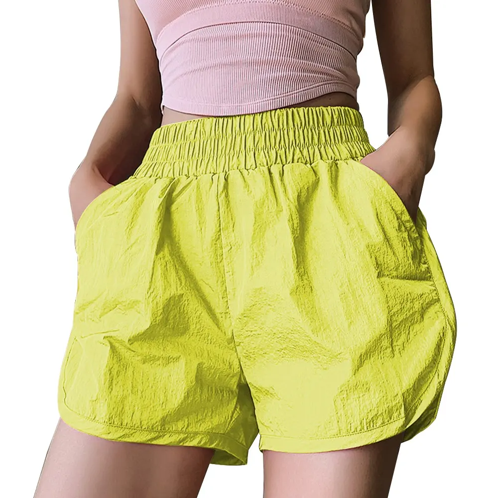 Pantaloni sportivi estivi 2024 da donna pantaloncini da ginnastica da ginnastica personalizzati traspiranti di colore brillante con tasche e Design caldo per abbigliamento sportivo