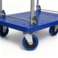 Chariot de transport en plastique à quatre roues pour la logistique d'entrepôt et la manutention en usine