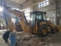 Chargeuse-pelleteuse Caterpillar CAT420F d'occasion, en état de marche et avec de bonnes performances
