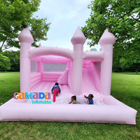 Château gonflable commercial rose pastel en PVC pour l'extérieur, idéal pour les fêtes et les événements