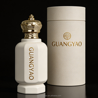 Vente en gros de flacons de parfum cylindriques en verre personnalisés de 100 ml, logo et boîte d'emballage personnalisables disponibles