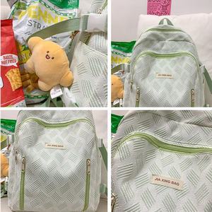 <span class=keywords><strong>4</strong></span> couleurs disponibles Sac d'école en nylon à imprimé rayé minimaliste de grande capacité avec étiquette de lettre multi-poches avec pendentif de poupée mignonne - Product Image 5